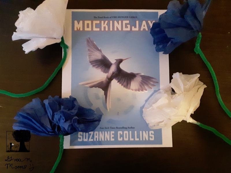 "Mockingjay" with paper flowers.